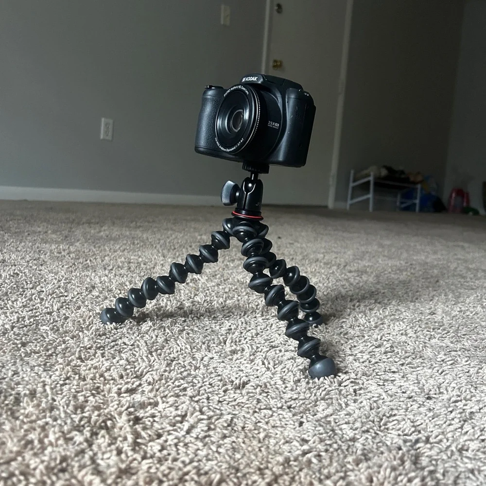 Black Camera with Flexible Tripod